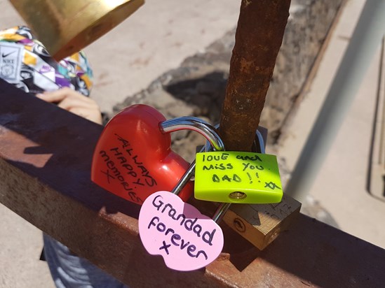 Dads padlocks in lanzarote big love lock (hear) from mum the green padlock is from Shane and the pink one is from me george and kids yours and mums  padlock is locked round mine georges and kids and shanes because u and mum always  hold us together x