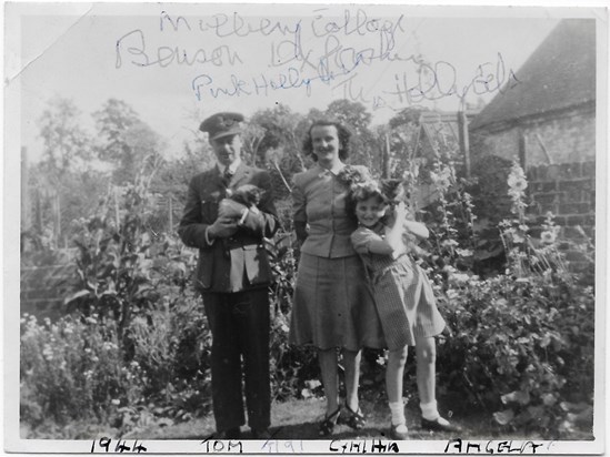 Angela, her father Thomas, and mother Cynthia in 1944