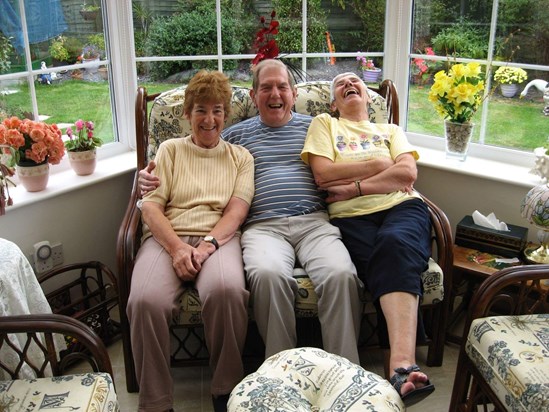 Mum having a laugh with sister Sue and brother in law Ron