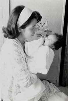 Yasuko with her baby daughter Julie in her arms