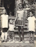 Iyetade as a child with her family.