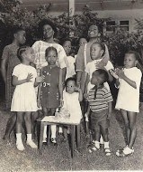 Iyetade and family as young children with Granny.