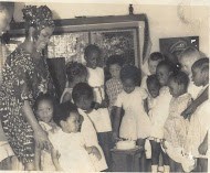 Iyetade and family at a young birthday party.