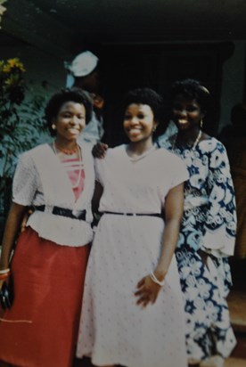 Tade and friends, UCH 1987 005 { Tade at the middle, Buki on the right and Ope on the left.