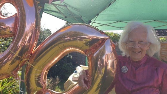 Dorothy with her 90th birthday balloons 