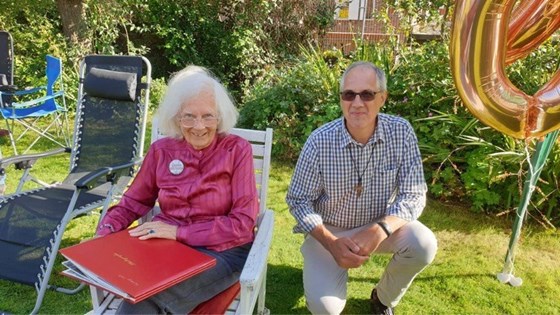 Dorothy with our family Pastor Stephen at her 90th birthday party 