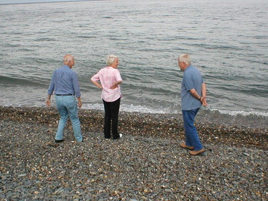 Ken, Vera & Peter trying to stop the tide coming in (IOM July 2006)
