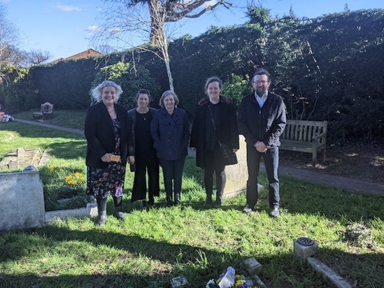 Visiting the grave of Rose's parents after her funeral