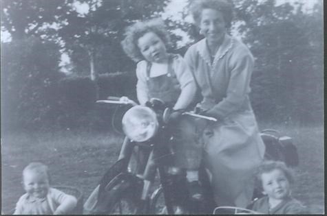 Kieran and Nancy on a Motorbike with Dee (left) and Pauline (right)