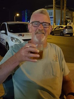 Derek enjoying a Southern Comfort and a cigarette on holiday