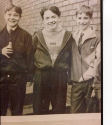 Cha at Cardinal Newman High School with two of his mates.