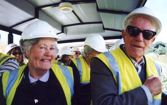 This photo is a classic, Barbara and Dad (James) in hard hats and yellow safety jackets,