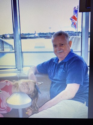 Lillie with Grandad on a boat trip up the Thames 