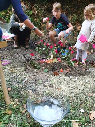 Blake's wonderful idea of sticking the roses into the earth 