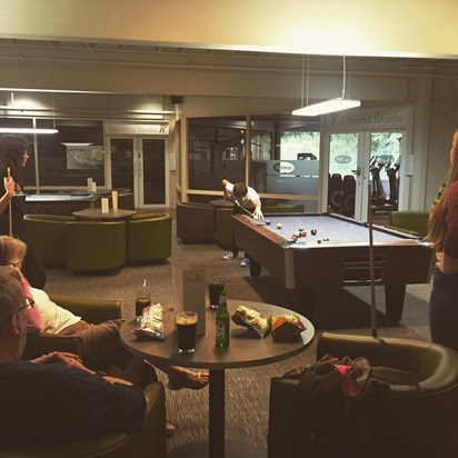 Family Playing Pool