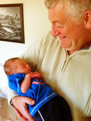 Super proud Grandad Sharky with his first cuddle with Koby. They'd go on to become thick as thieves!