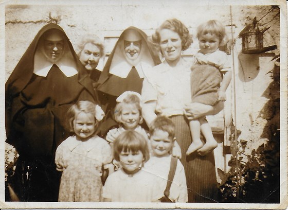 inside dad as child with sisters mother and scary nuns