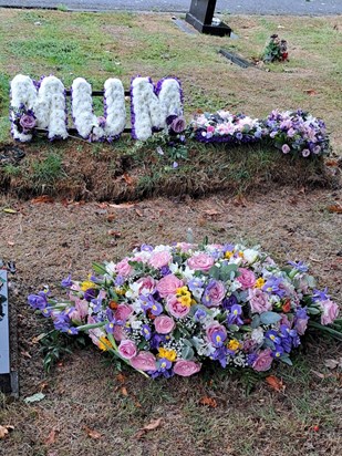 20220817 095515 flowers placed on grandma's & grandads grave 