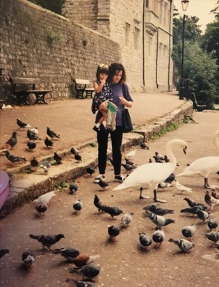 Christina and Bébhínn feeding the swans together 