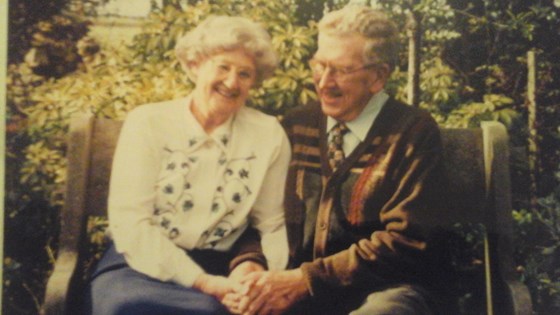 Jean with Peter in the garden in Waterlane