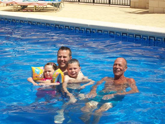 Dad, Scott and kids in the pool!