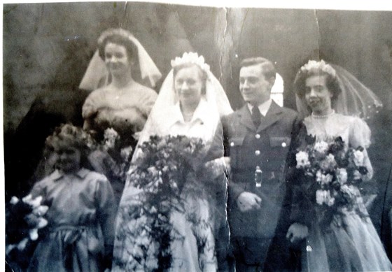 Mum (last on right) at her brother Douglas's wedding, early 1950's