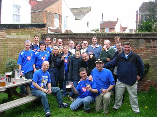 Cord celebrating a famous Pompey win with family and friends.