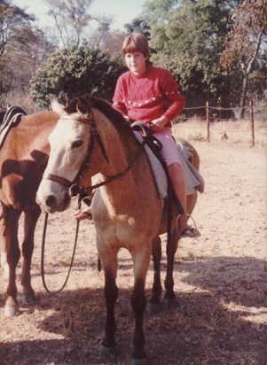 Pippa riding in Zimbabwe.