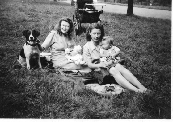 Emi with John and Scap the dog, Margaret with Rod 1947