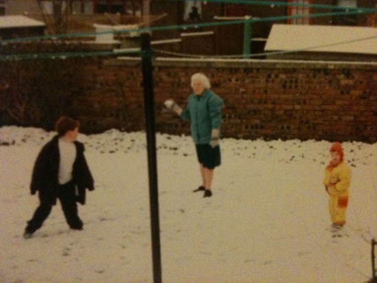 Gordon and Colin having snowball fights with Granny.