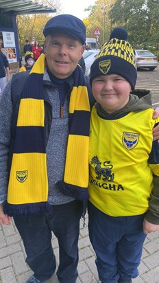 Pepe and James at the football, Pepe wearing the scarf James had just bought him.  And belief it or not Oxford won!