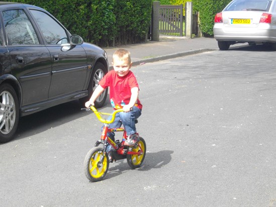 learning t ride his bike, it took all ov half a day :] x