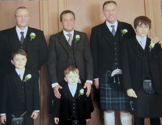 Hugh with brothers and nephews