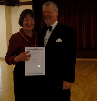 Ann Kemp receiving her well earned Gold Medal for Argentine Tango 