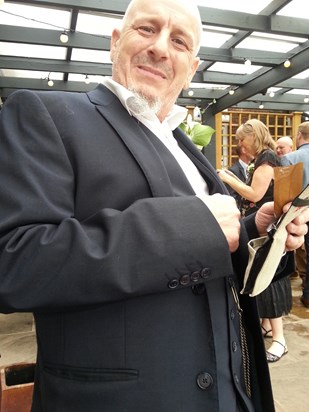 Stu at his sister, Dawn & Jay's wedding. Stu's idea of posing for a picture!! haha