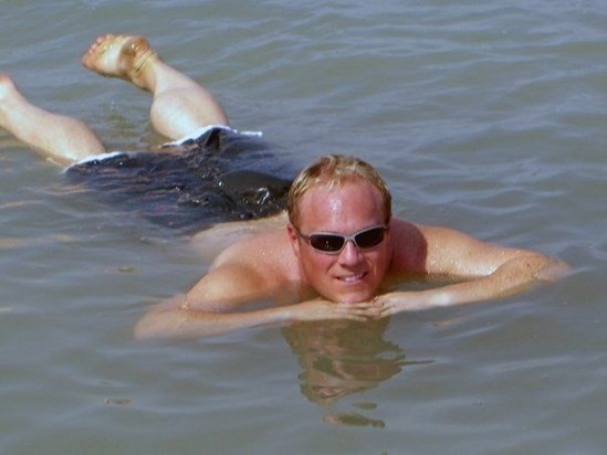 Jason floating in the Dead Sea