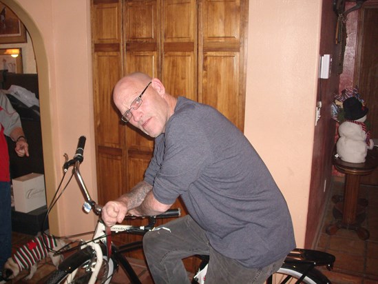 12/26/11 Todd and his new bicycle he just got for Christmas from his mom.