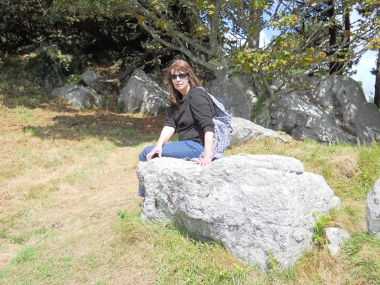 linda sitting on rock on st michels mountxx