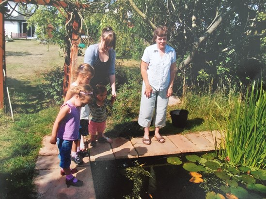 Visiting Sharon and Naomi for the morning and looking at the fishpond. Ruby, Lily and  Sam Redfern loved coming to see her. Around 2010 xx