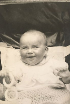 Chris as a baby - with that very distinctive smile