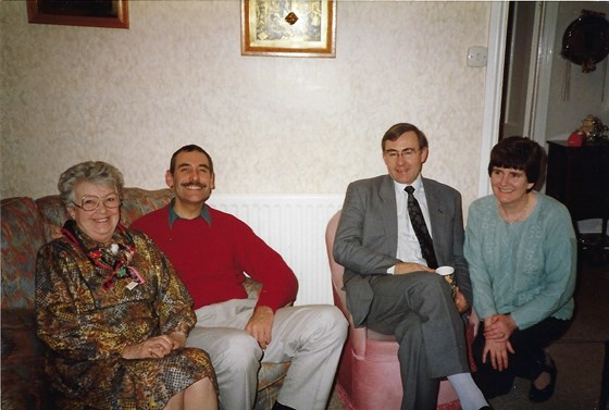 Andy and his mum with Lesley and John one Christmas