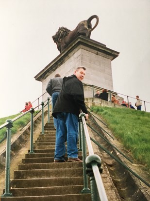 George making the climb up the Lions Mound/ Waterloo, Belgium.