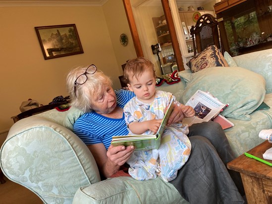 Reading with her grandson