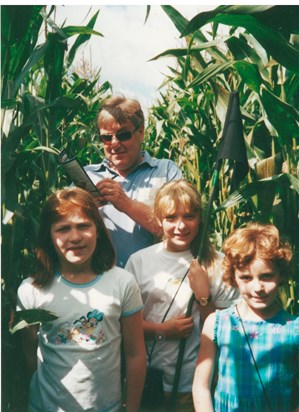 Chris and the girls tackling the maze, 2002