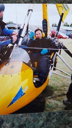 Gill flying a Microlite 2011