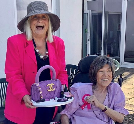 Soina and Leslie with her 75th Birthday cake