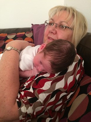 Nanny's first cuddle with first grandchild, Jasper.