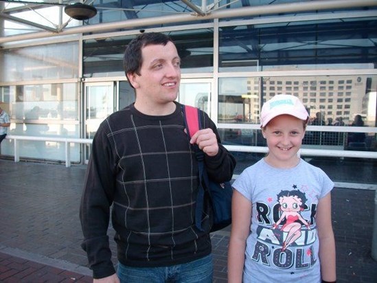 tony outside the airport with shannon for our first holiday abroad