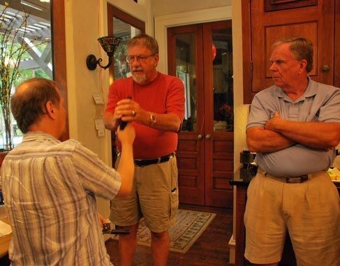 Dick demonstrating to Kevin how to take away a weapon- Bill Fowler looks on