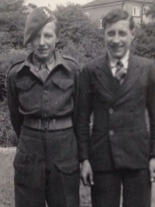 Ted in his army cadet uniform, standing next to brother William.